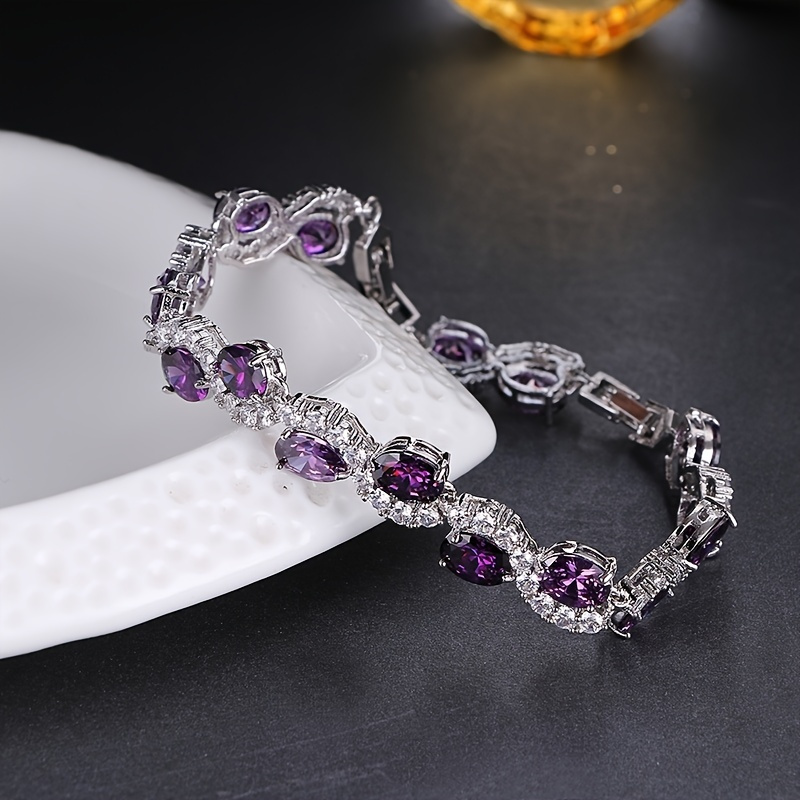 

Radiant Luxury Purple Oval Link Bracelet - Exquisite Silver-plated Craftsmanship With Dazzling Copper Zirconia Stones - A Fashion-forward Hand Accessory For Birthday And Anniversary Celebrations