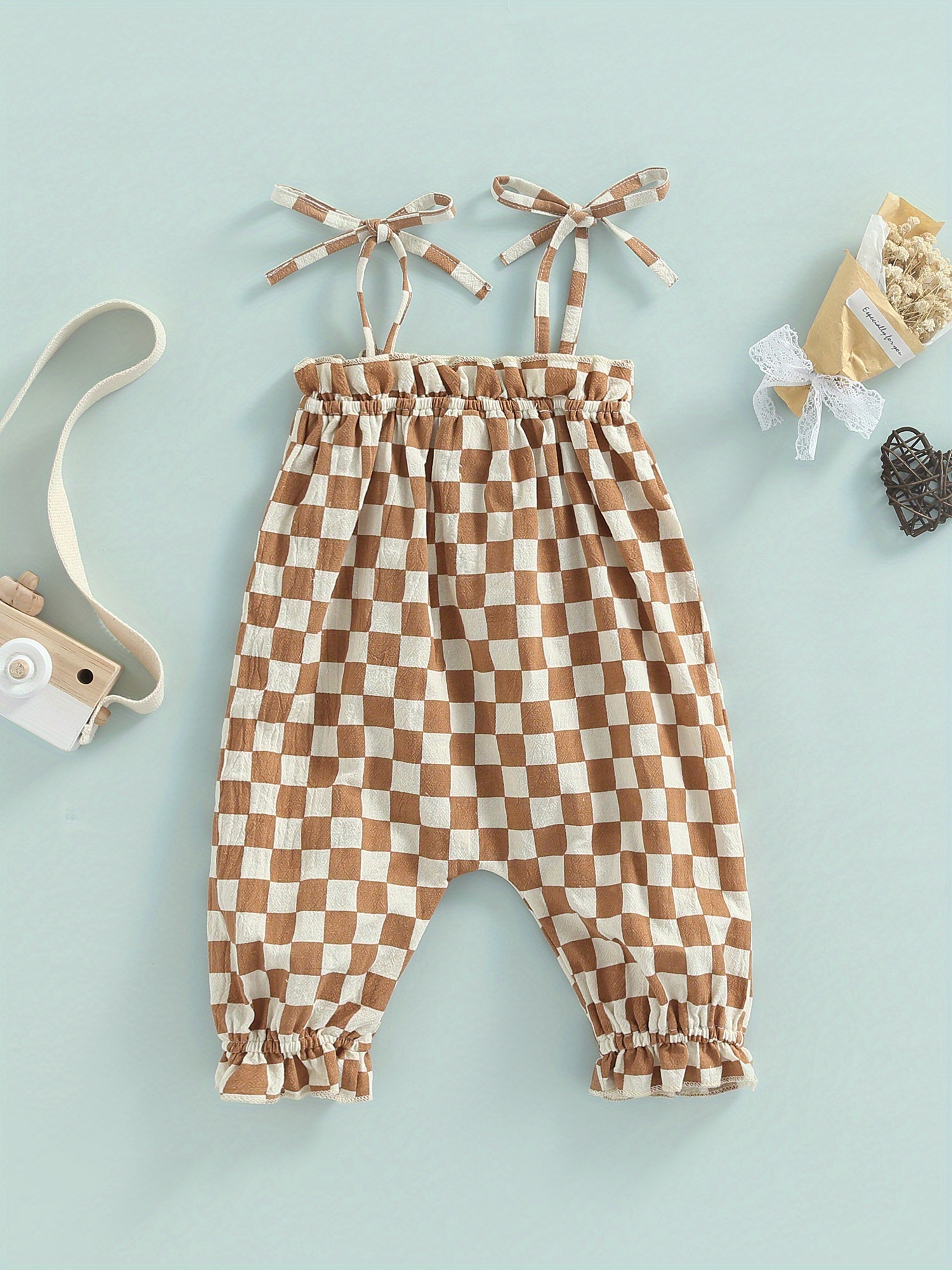 baby checkered overalls sold on Temu United States