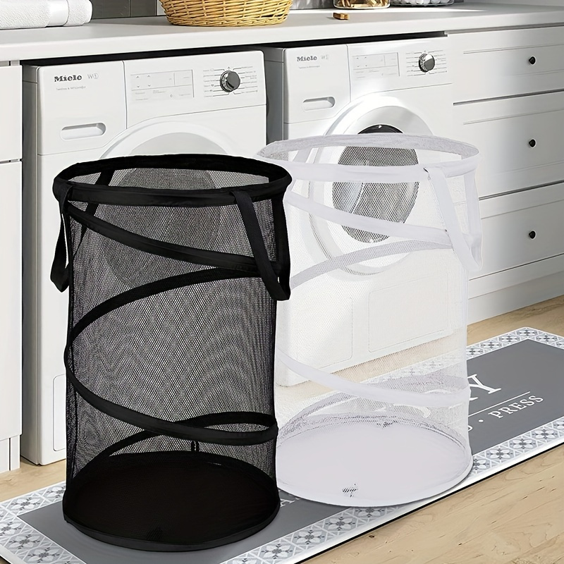 

A High-capacity Pop-up Laundry Basket - Foldable, Portable, And Mesh - Is Storing