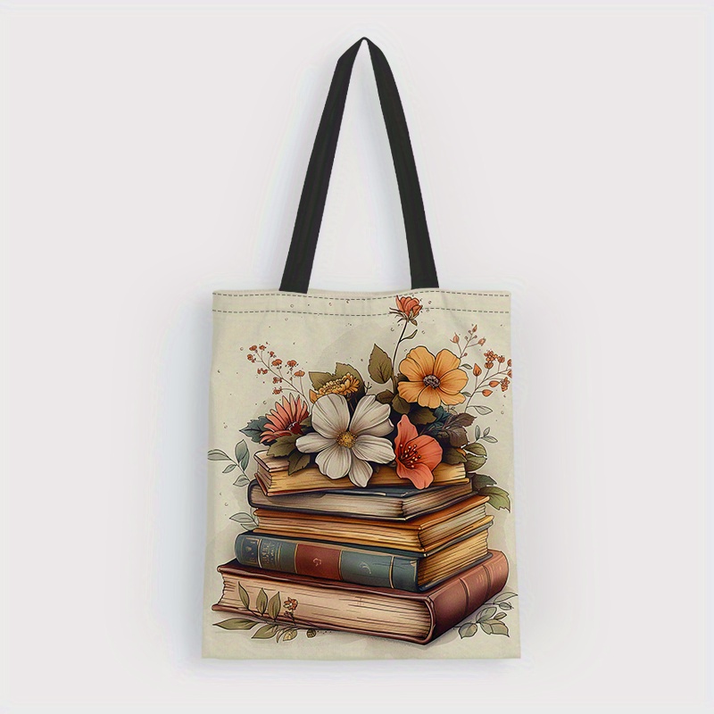 

1pc, Stack Of Books With Flowers Canvas Tote Bag, Crossbody Bag, Tote Bag, Canvas School Shoulder Bag, Lightweight Grocery Shopping Bag, Best Gift For Teachers Friends, Graduation Print With A Muted