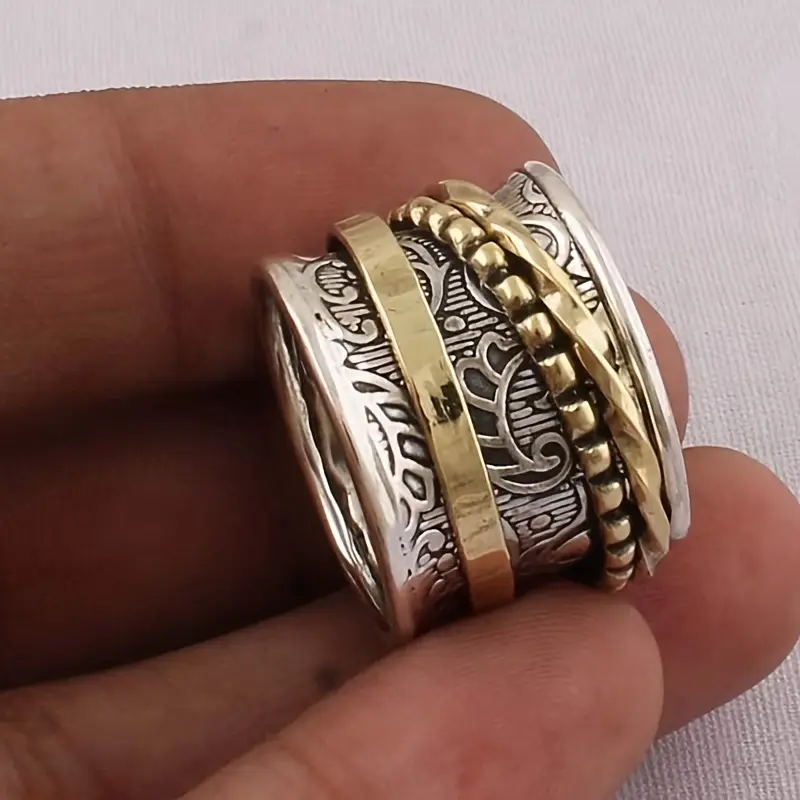 a vintage alloy golden ladys ring with a european wide face a as a valentines day gift a rotating decompression ring Product details 2