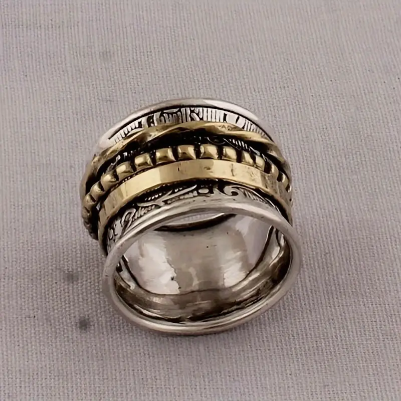 a vintage alloy golden ladys ring with a european wide face a as a valentines day gift a rotating decompression ring Product details 3