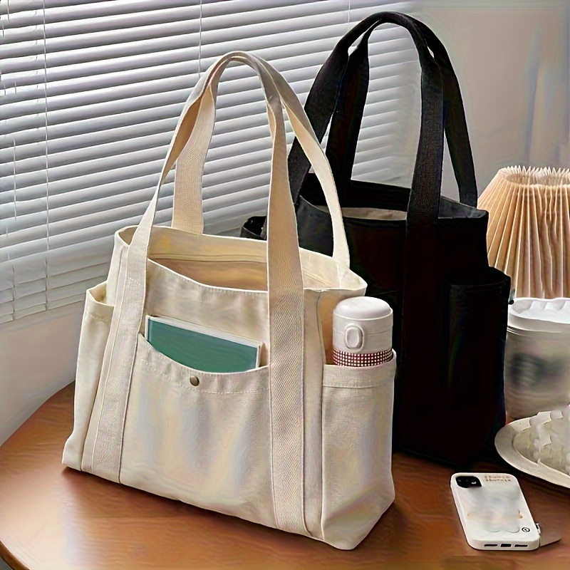 

Large Capacity Canvas Tote Bag With Shoulder Strap, Zipper Closure, Polyester Material, Perfect For Daily Commute And Leisure