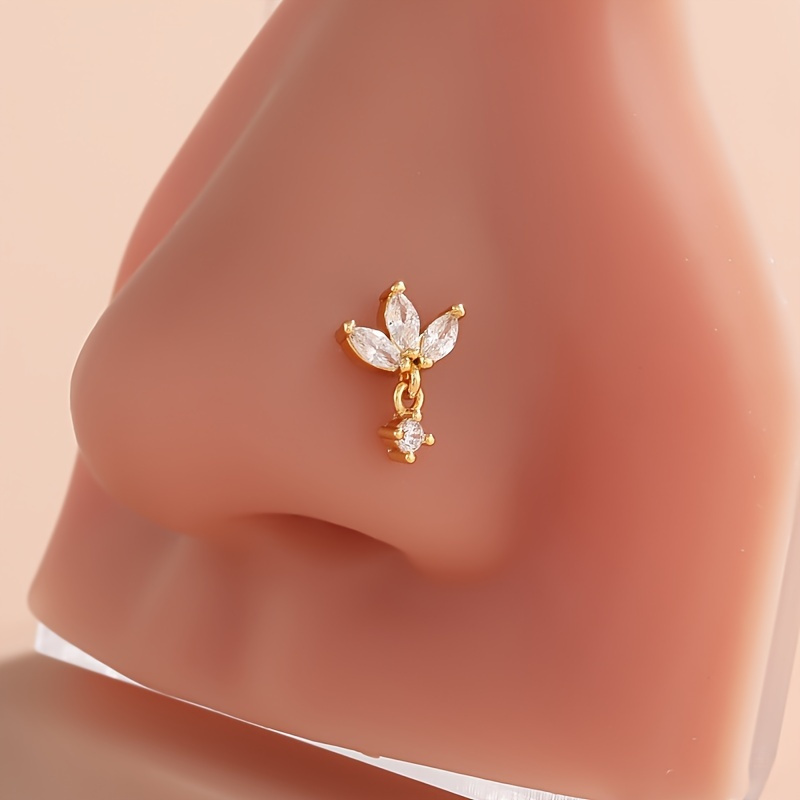 

An Elegant Nose Piercing Jewelry Body Accessory With A Cold, Shiny Cz Leaf Nose Ring.