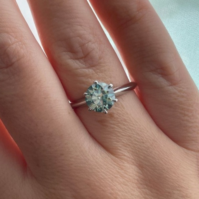 Green Moissanite Round Cut Solitaire Ring in Sterling Silver