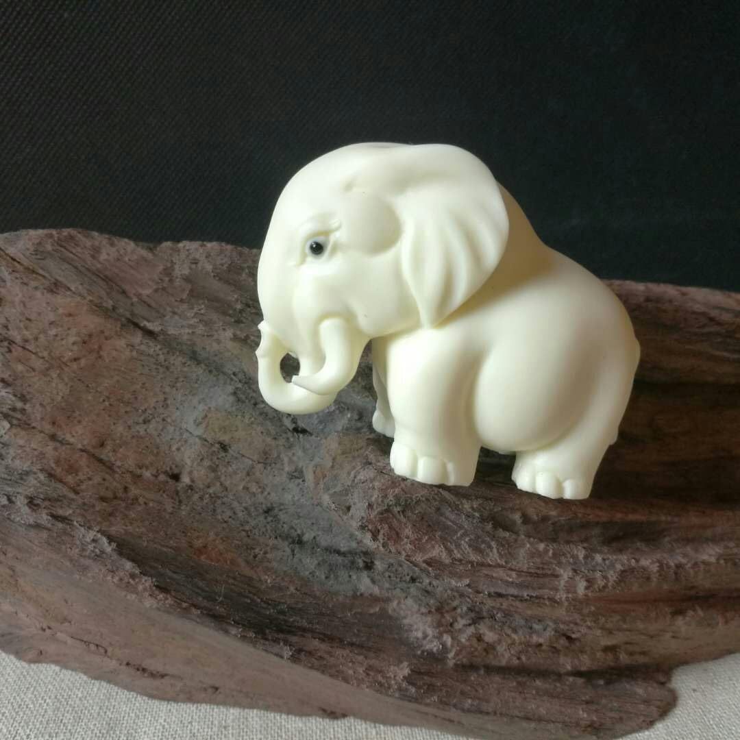 

Handcrafted Nut Elephant Figurine - Engraved, Feng Shui Decor, Tabletop Display & Unique Gift Idea