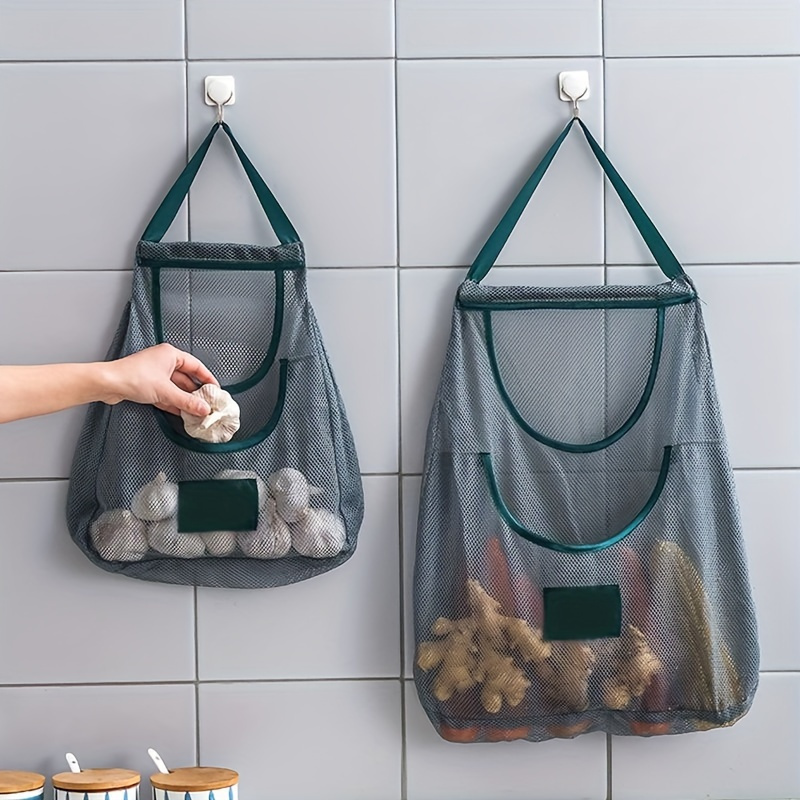 1pc breathable mesh kitchen storage bag for fruits vegetables wall mounted portable organizer with green handles pet material ideal for ginger garlic and more vegetable storage rack details 0