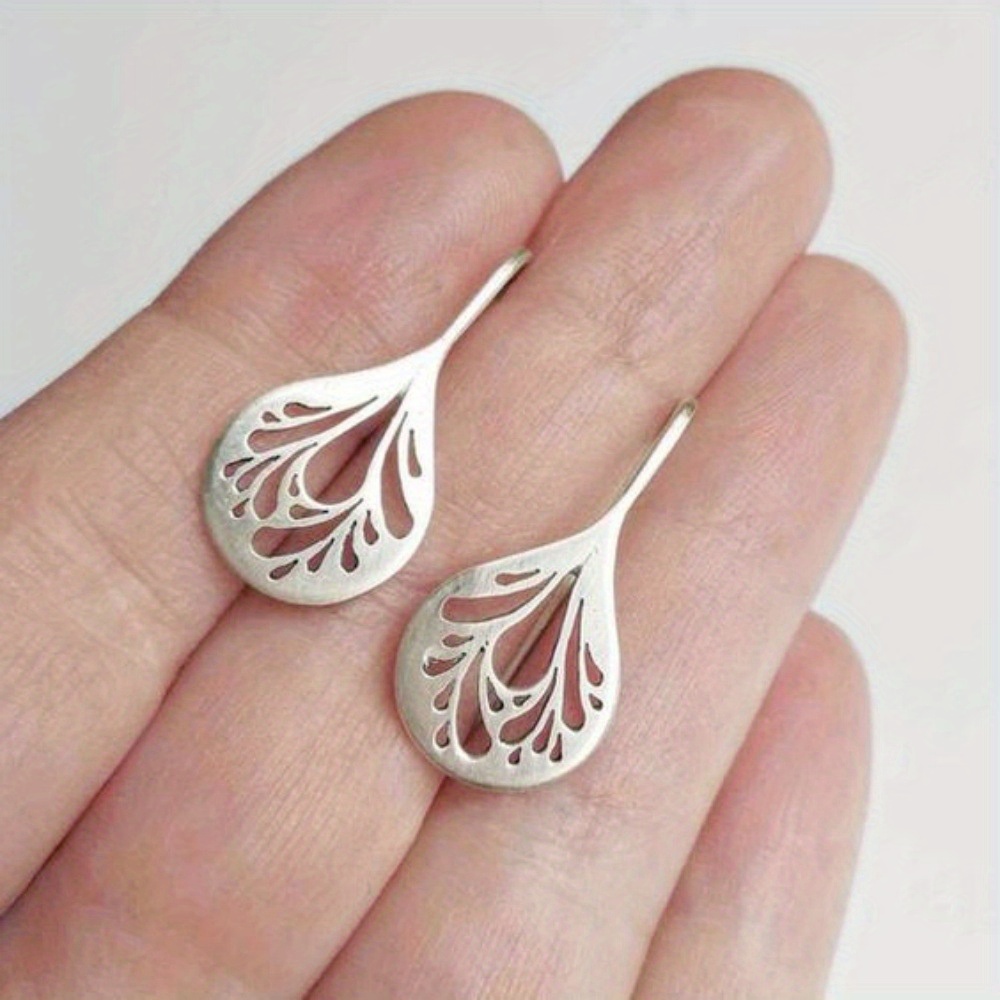 

Vintage Boho Leaf Earrings: Silver-tone Alloy With Intricate Cutouts, Suitable For Everyday Wear And Parties, Perfect For Valentine's Day