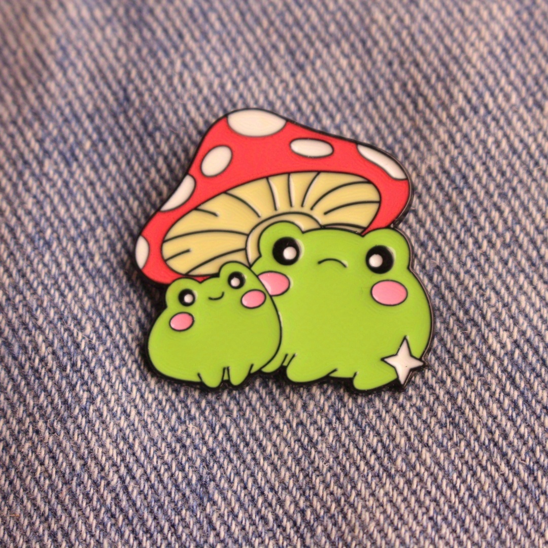 

Whimsical Green Frog And Mushroom Enamel Pin - Perfect For Backpacks And Clothing Accessories