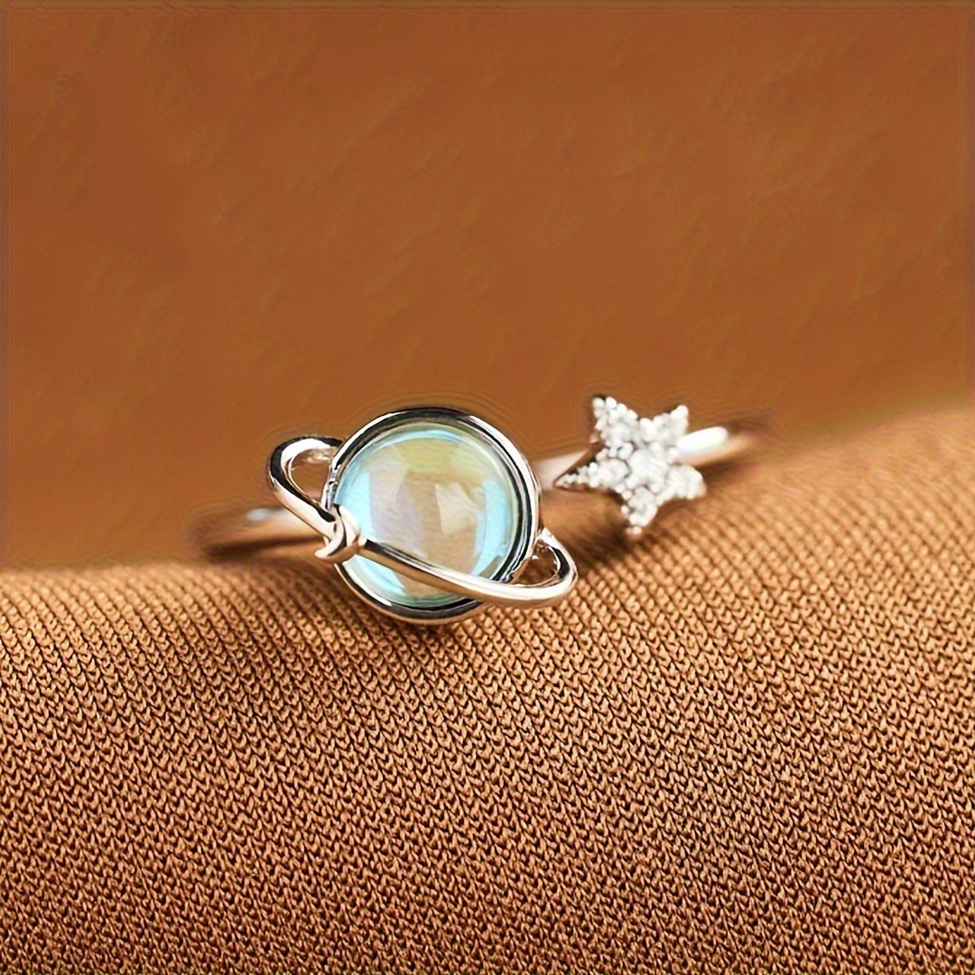 A Stylish And Unique Lady's Ring With Delicate And Creative Design Of A Small Earth And Moon Surrounded By Blue Synthetic Gemstones, Adjustable Opening Suitable For Daily Wear And Birthday Gift (without Box).