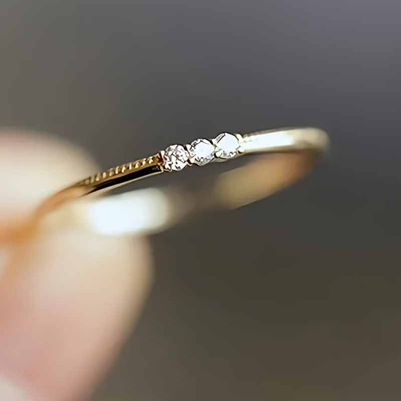 Elegant Thin Band Ring with 3 Synthetic Zirconia Stones