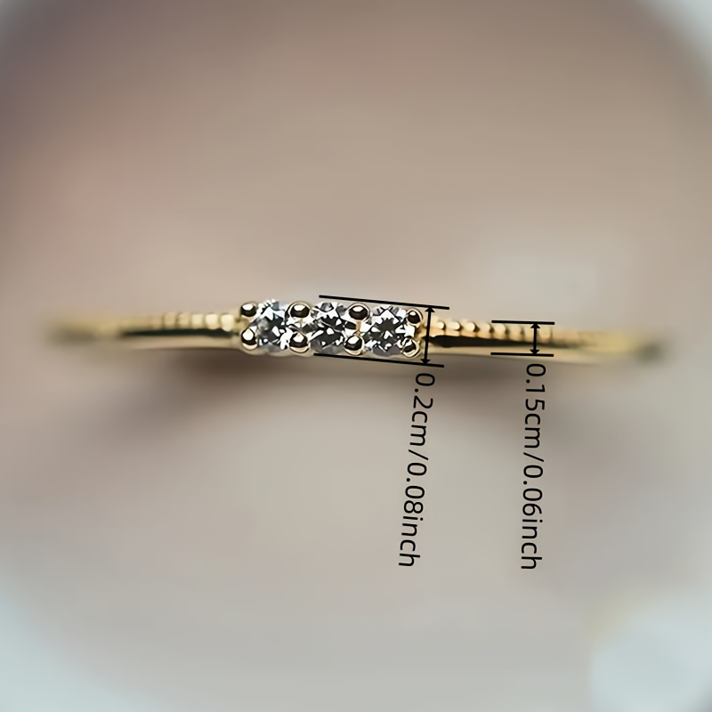 Elegant Thin Band Ring with 3 Synthetic Zirconia Stones