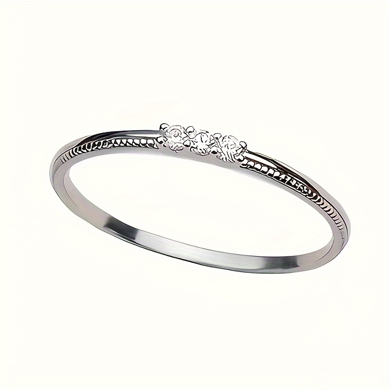 Elegant Thin Band Ring with 3 Synthetic Zirconia Stones