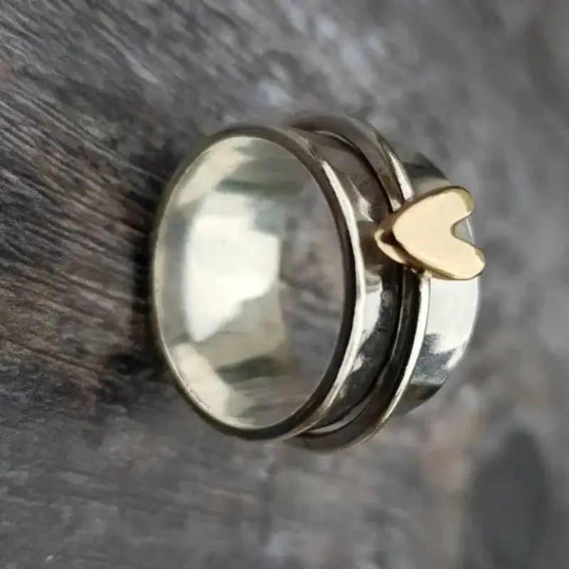 european and american simple and fashionable two tone peach heart rotatable womens wide ring perfect gift for parties birthdays christmas valentines day and anniversaries Product details 1