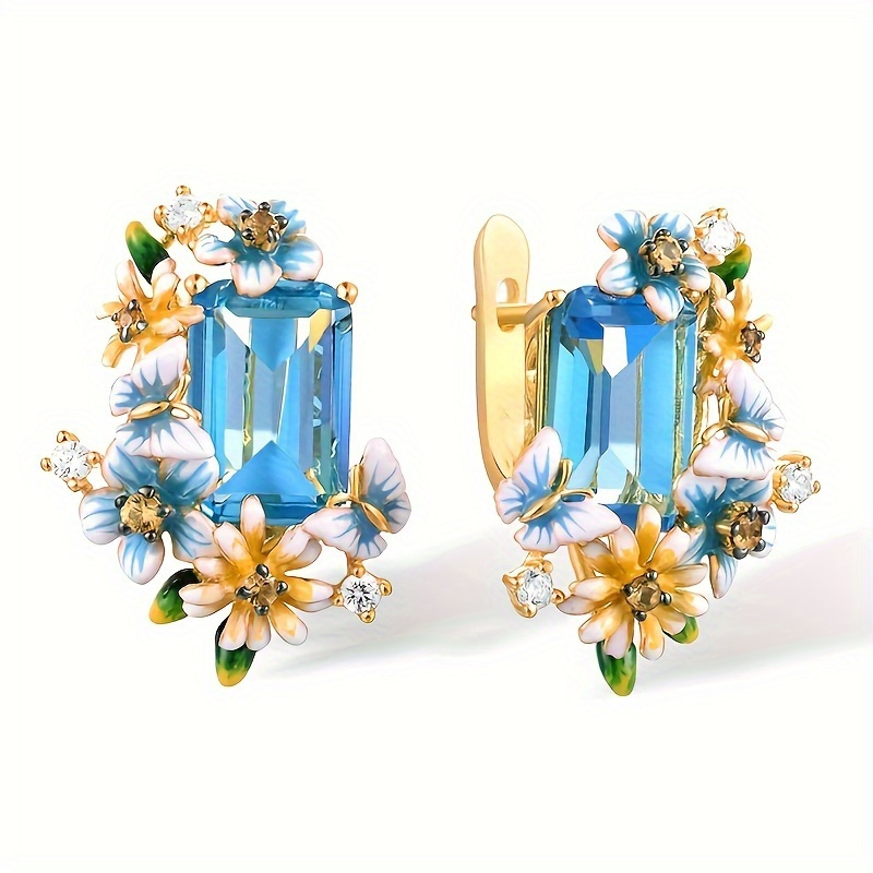 Image of A Pair Of Vintage-style Circular Earrings For Women Featuring Three-dimensional Floral Designs And , Set With Blue Synthetic Zirconia Stones, Perfect For Parties And Anniversaries
