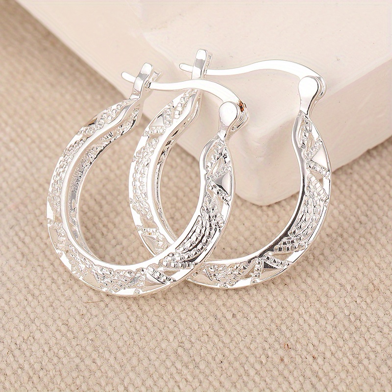 

Tzliwen Textured Hoop Earrings