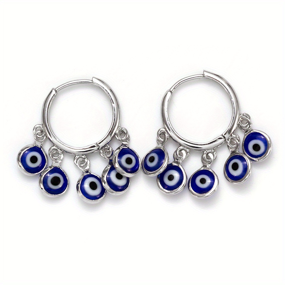 

A Pair Of Hot Sale European And American Devil's Eye Ear Ring Creative Design Personality Blue Eyes Without Piercing Earrings