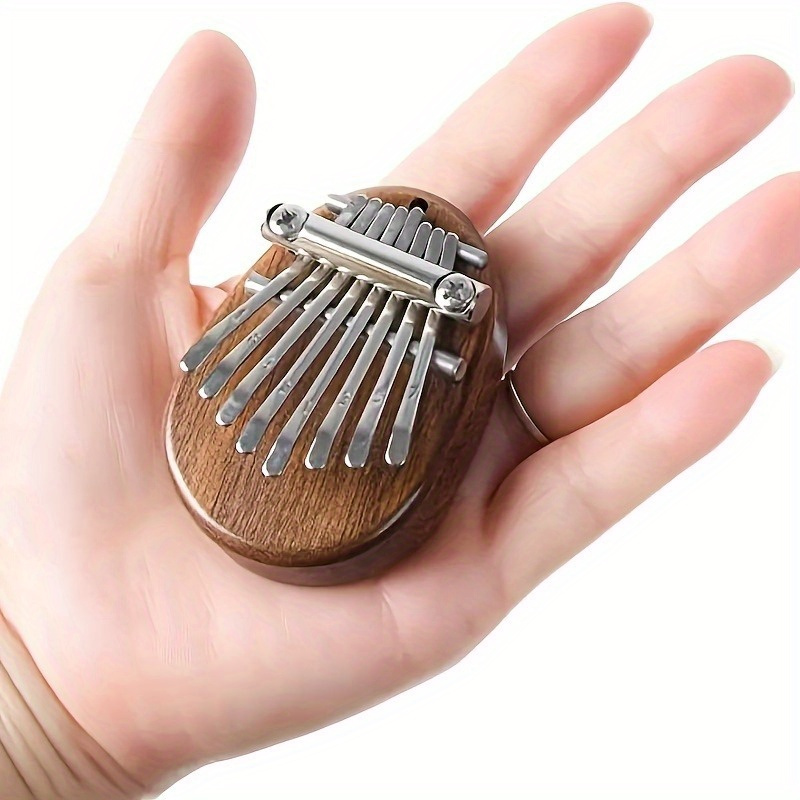 

8-tone Kalimba Finger , High-quality Miniature Handheld Keyboard, Portable Party Gift For 14+, No Power Required, Artificial Wood Material, Home & Kitchen Party Supplies