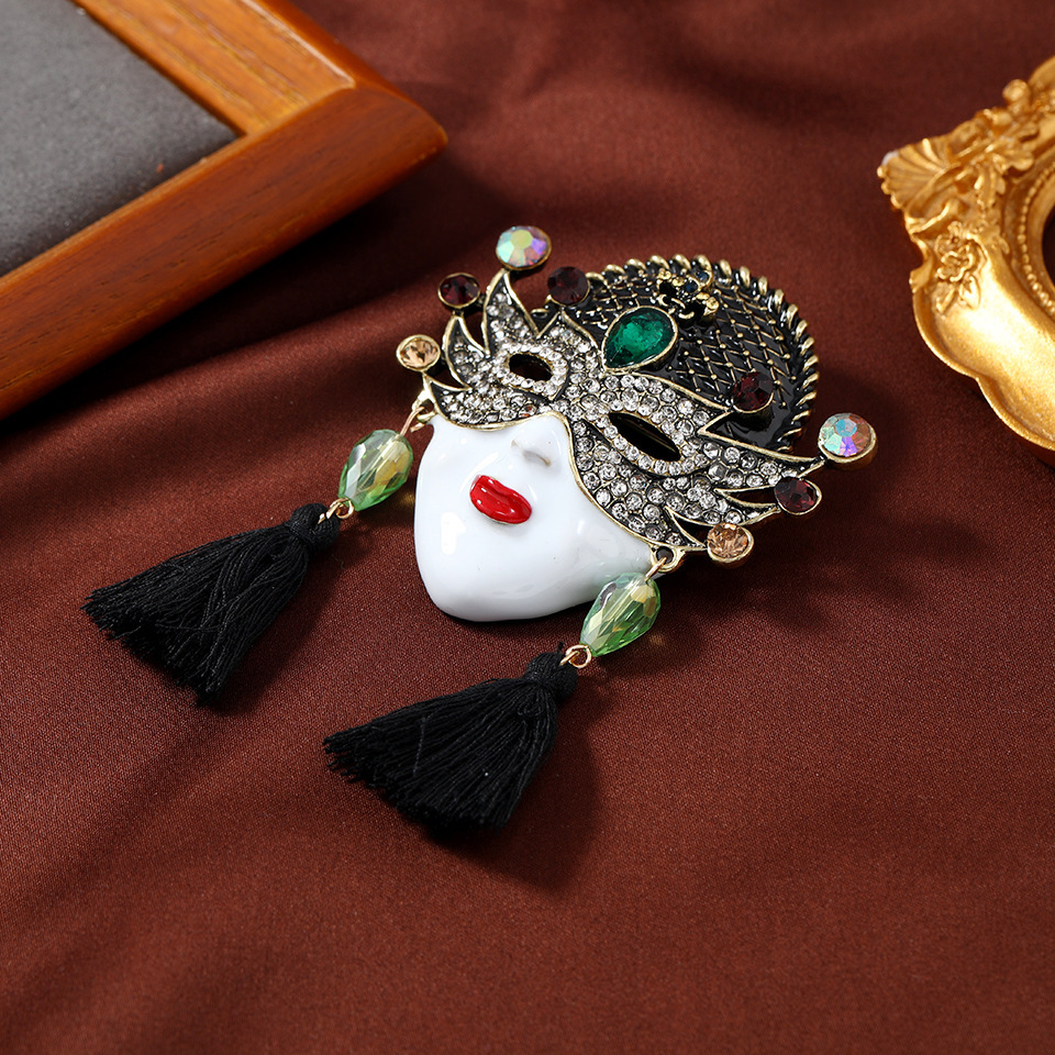 vintage inspired enamel mask brooch with tassels unique crystal accents   parties banquets details 2