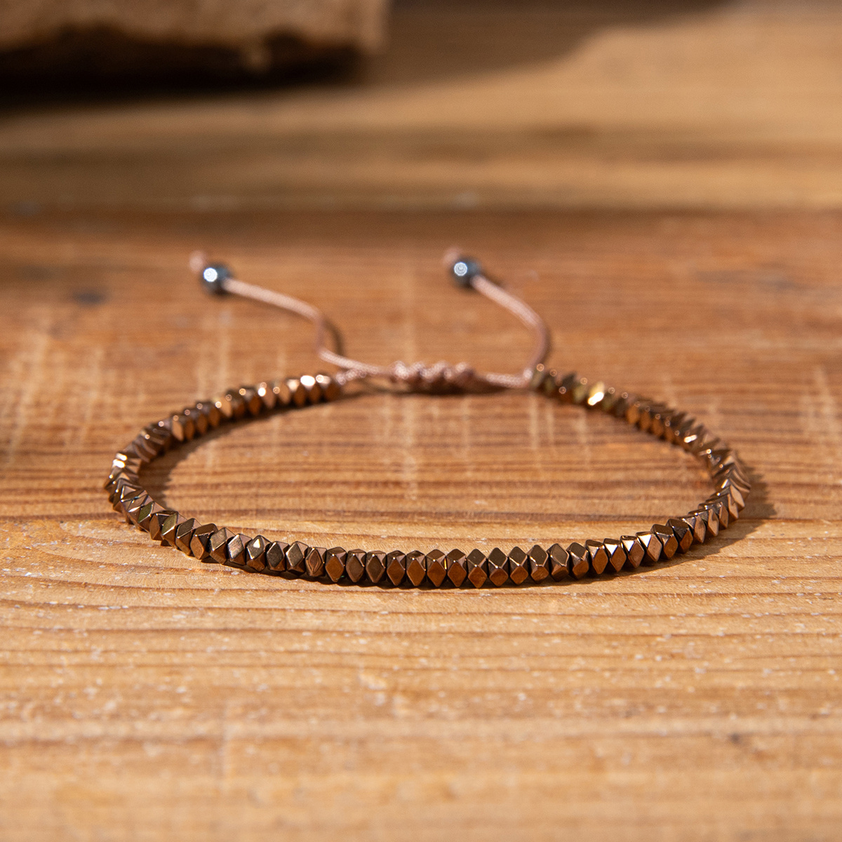 A Unisex Bohemian Vintage Style Knitted Bracelet With Hematite Beads, Featuring A Simple And Versatile Design.
