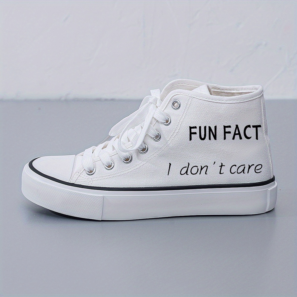 Black and white women's sneaker sold by 100 Spartans