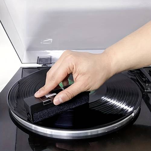 a brush designed for cleaning vinyl records and turntables to remove dust from your cd and lp records