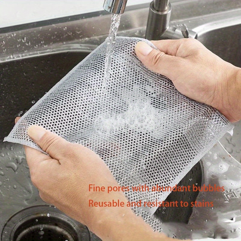 a cleaning cloth made of silvery wire for kitchen stoves steel wire dishwashing cloth   oil   removing and dirt removing   to   wire and silvery wire cleaning cloth details 1