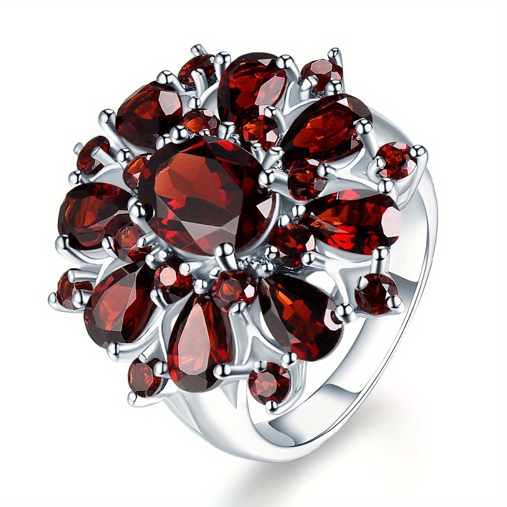 

A Stylish Ring With A Personality, Featuring A Single Elegant Pomegranate Red Zirconia .