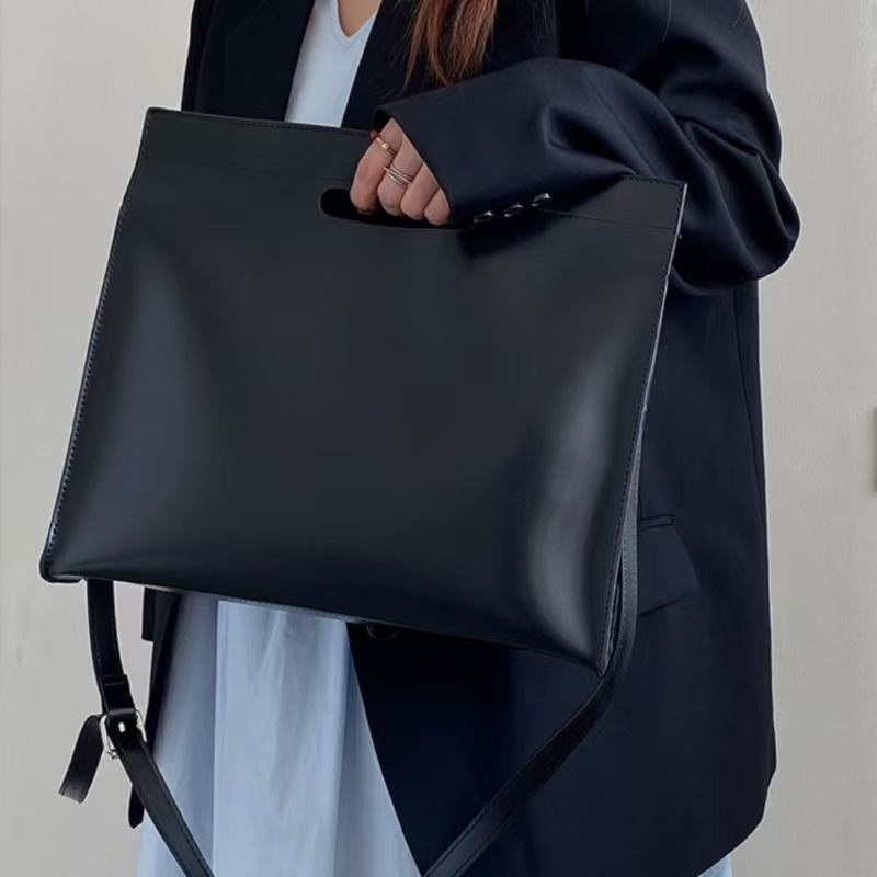 

Sac Fourre-Tout Professionnel et Chic en Similicuir Noir pour Femme - Sac à Épaule et Bandoulière Polyvalent avec Bandoulière Détachable, pour et l'