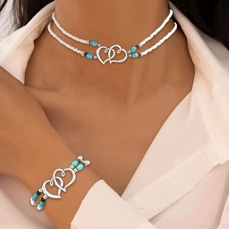 

2-piece White Bead And Green Turquoise Bohemian Necklace And Bracelet Set, Featuring A Double -shaped Pendant Design, Suitable For Fashionable Beach, Vacation, And Jewelry