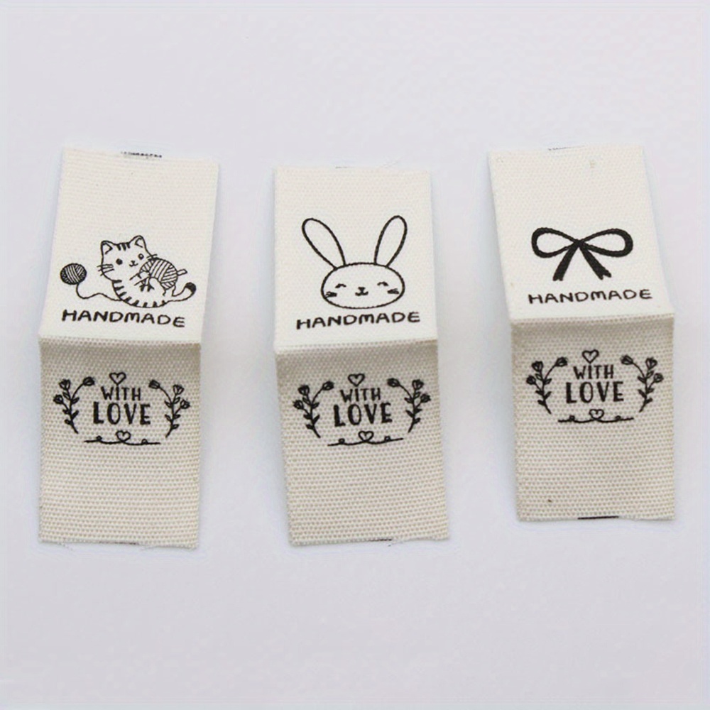 

20pcs Cotton Fabric Labels With Cute Animal Designs And '' Text For Crafts, Sewing, Clothing, And Toys - Soft Folded Cloth Tags For Handcrafted Goods