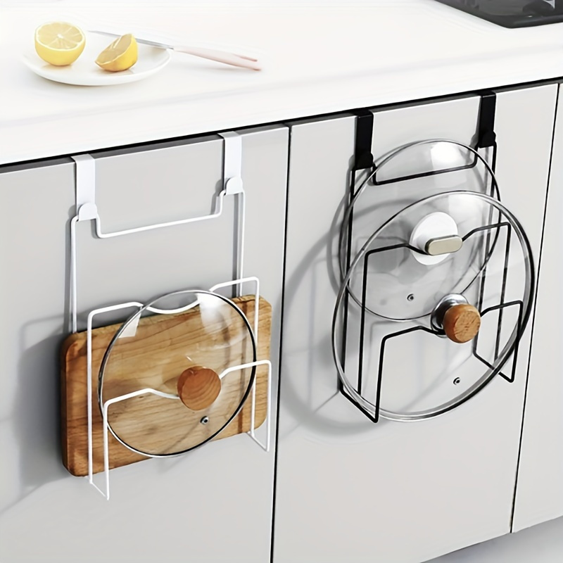 

Wall-mounted Iron Pot Lid Holder And Cutting Board Organizer. A No-drill Kitchen Storage Solution. A Holiday Gift For Organized Kitchens.