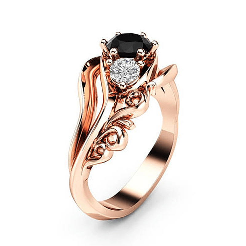 

Elegant Rose Golden Floral-inspired Ring With Black Zirconia & Clear Cubic Zirconia - Luxurious Copper Jewelry For Engagements, Birthdays & Celebrations