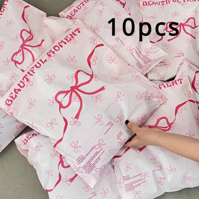 Image of 10pcs Pink Bow Waterproof Courier Bags With Self-adhesive Labels - Perfect For Clothing & Gift Packaging, Durable Plastic Mailers, Airplane Box, Flower Envelope, Mailing Bag