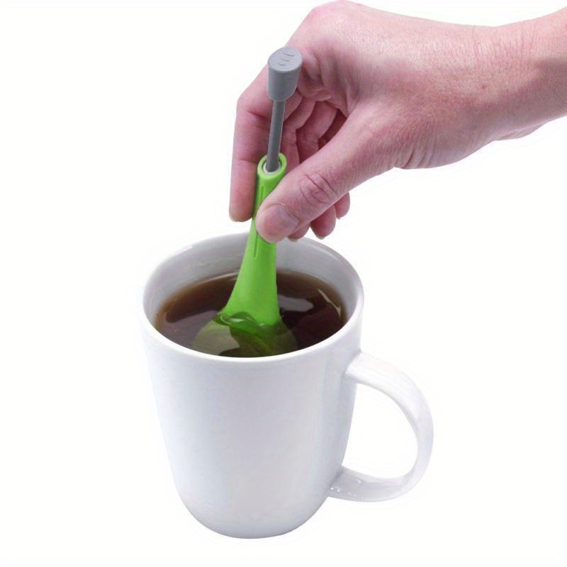   innovative   infuser metal tea coffee strainer with stirring press handle   and   gadget for loose leaf tea and ground coffee details 1