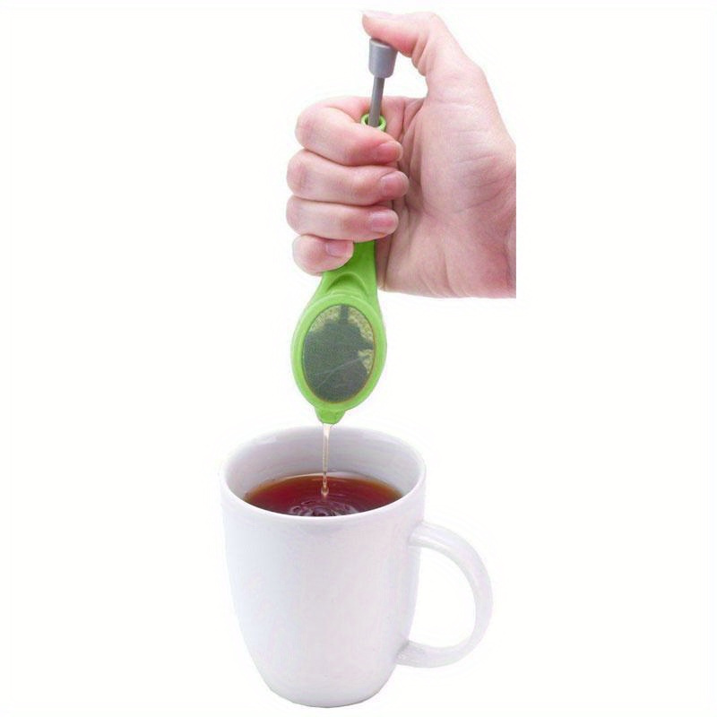   innovative   infuser metal tea coffee strainer with stirring press handle   and   gadget for loose leaf tea and ground coffee details 2