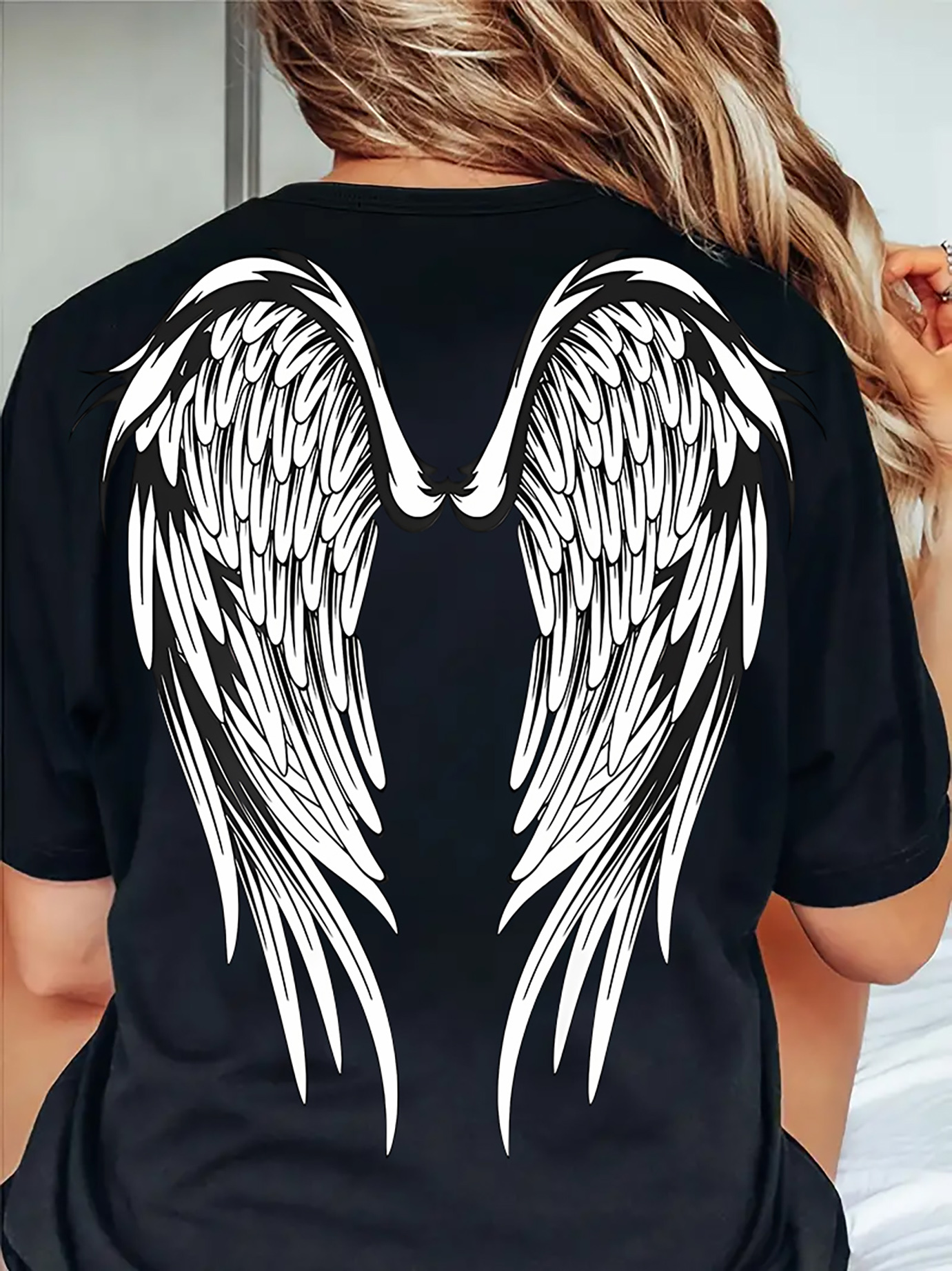 angel wings shirt sold on Temu United States