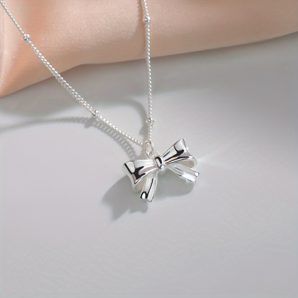 TEMU A Silvery Bow Necklace - For Any Occasion, Suitable For Men And Women