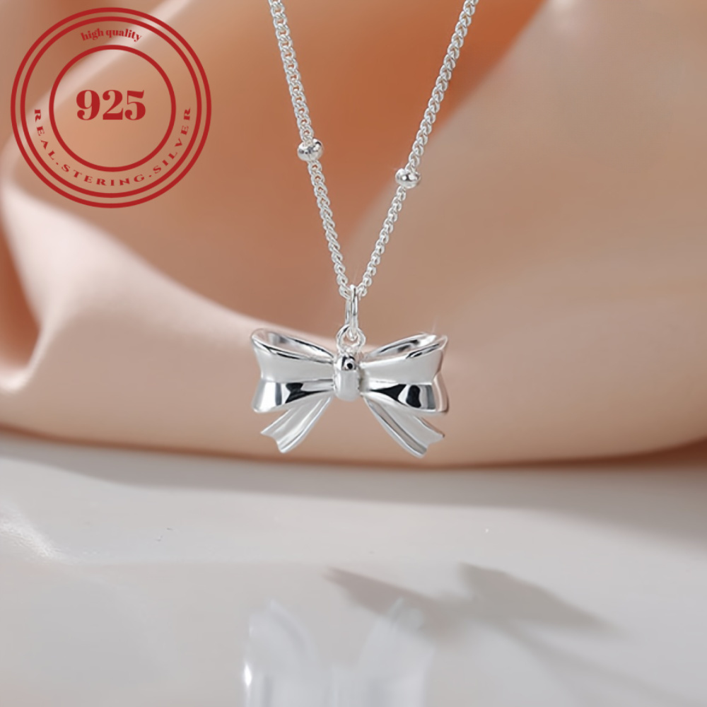 

A Silvery Bow Necklace - For Any , Suitable For Men And Women