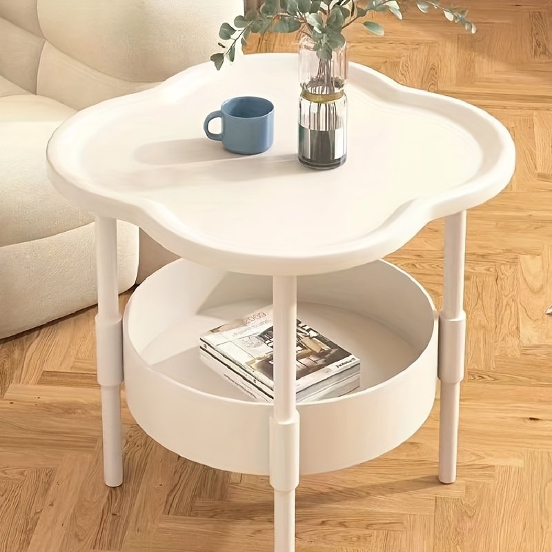 

Table basse moderne et simple aux bords arrondis avec fonction de rangement - matériau en plastique, installation au sol, table basse multifonctionnelle, adaptée à différents types de pièces, Étagères