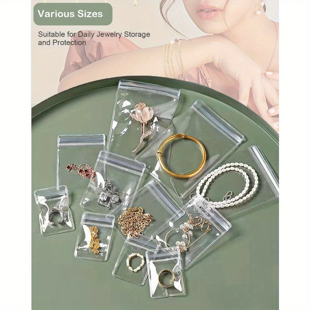   3 in 1 acrylic jewelry organizer with 60 portable bags plastic storage box for earrings rings necklaces bracelets travel friendly jewelry organizer with dividers Product details 0