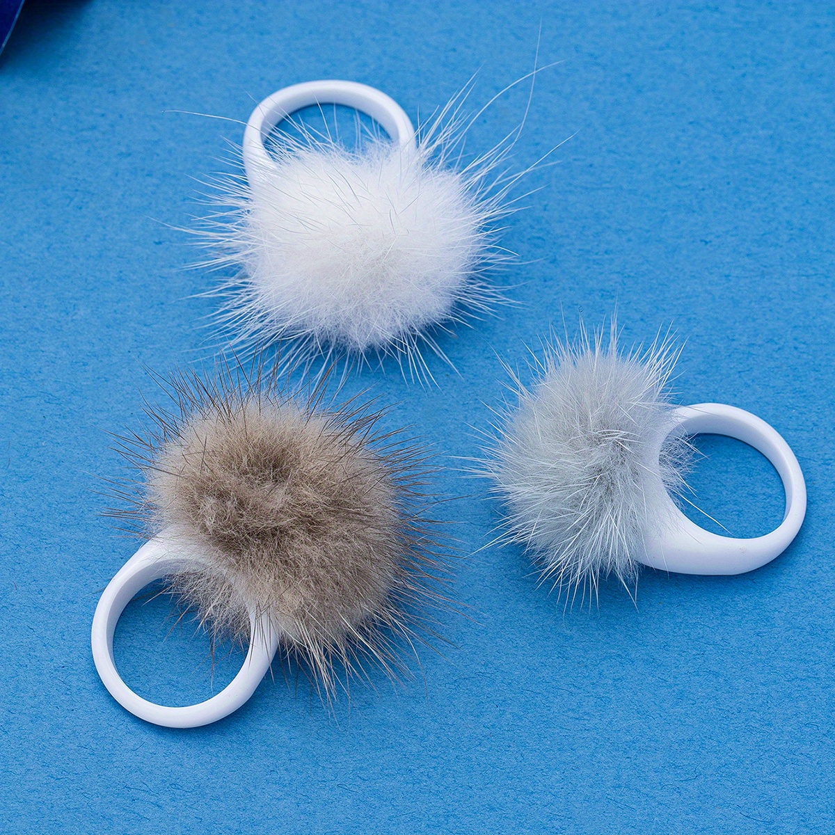 Fashionable Furry Ball Ring Accessory