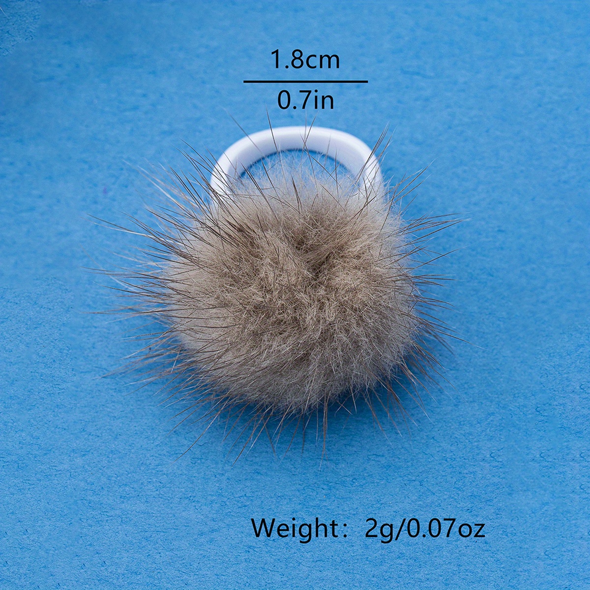 Fashionable Furry Ball Ring Accessory