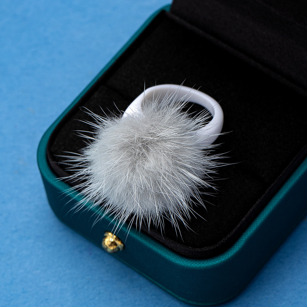 Fashionable Furry Ball Ring Accessory