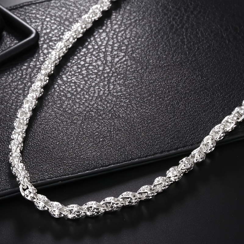 

A Sleek Snake Necklace Made Of 925 - Perfect For And Special , Showcasing A Necklace