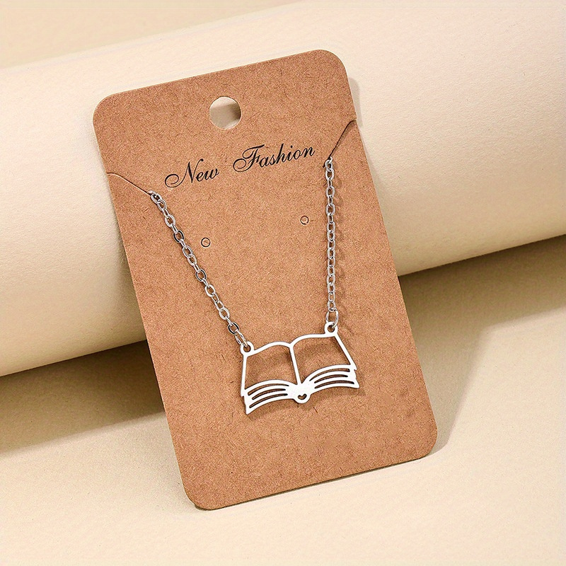 TEMU 1pc A Stylish Hollow Book Pendant Necklace, Plated With 18k Gold Plated, Perfect For Women. An Ideal Gift For Graduation Season And Suitable For