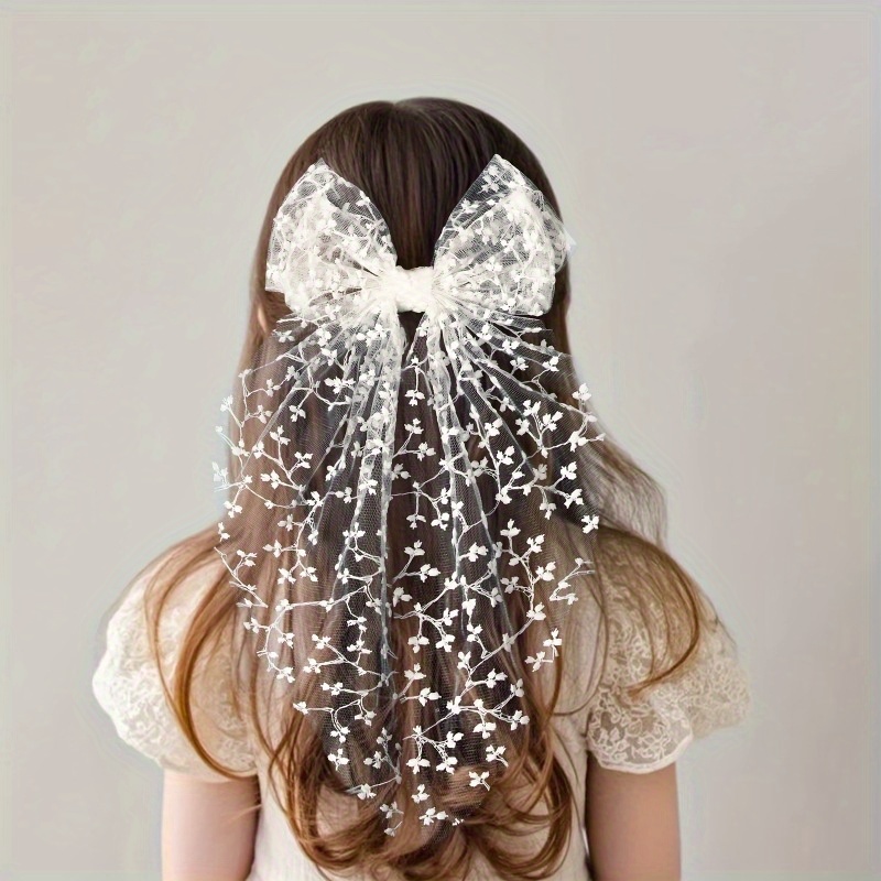 lace bow hairpin with a   featuring embroidered long ribbons for women