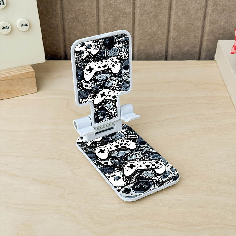 TEMU A Portable Telescopic Phone Holder Designed With A Retro Game Controller Pattern, Compatible With For All Phone Models And Adjustable For