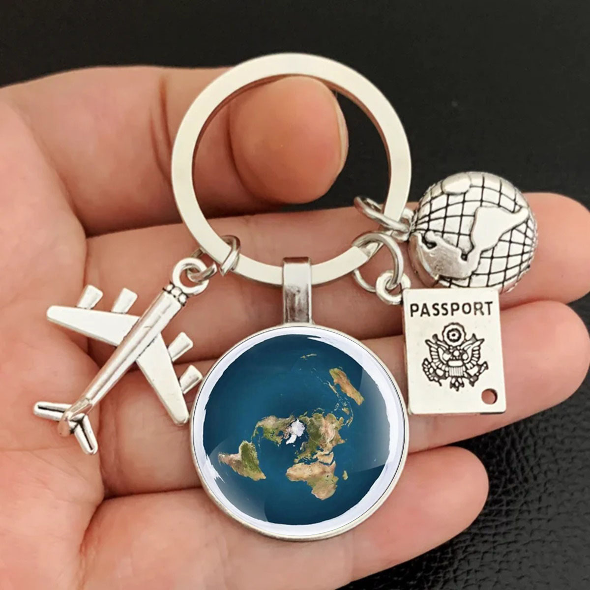 

Circumnavigation Of The Earth Of Melan, Time Jewel Key, Travelling Keyring, Travelling Keyring