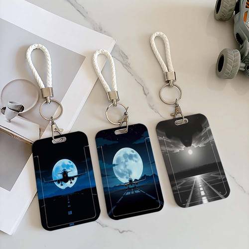 artikel foto 2d duurzame plastic kaarthouder met cartoon sterrenhemel en ufo ontwerp, ideaal voor studenten, professionals, artsen en verpleegkundigen. deze herbruikbare id houder wordt geleverd met een lanyard, waardoor het een geweldig reisaccessoire is.